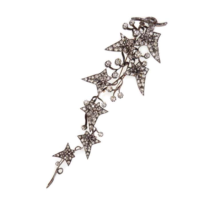Diamond cluster trailing ivy leaf pendant brooch, naturalistically modelled as a hanging stem